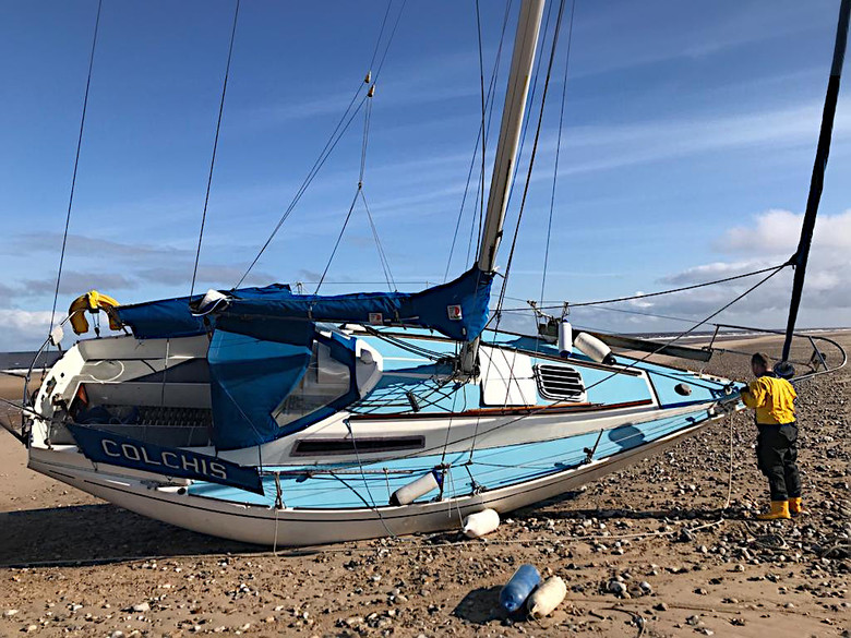 A bridle is rigged and an anchor laid out, ready to refloat the standard yacht 'Colchis' on the afternoon tide, 6/3/20