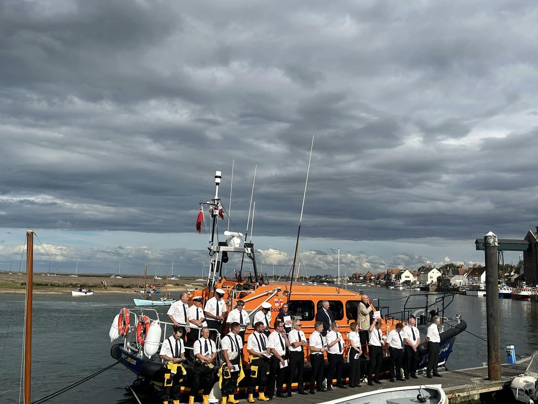 Lifeboat and crew alongside for the 62nd Annual Lifeboat Service at the quay