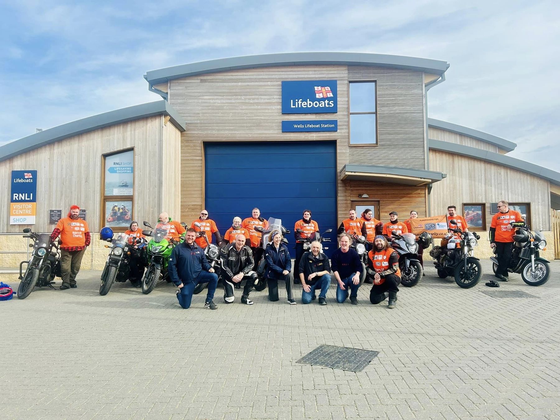 Riders of Charity ride at Wells with members of the crew