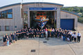 RNLI Wells volunteers - crew, launchers, managers, guild, shop and visits staff all together for 'One moment, one crew'