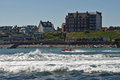 Cromer inshore lifeboat at speed off Sheringham prom